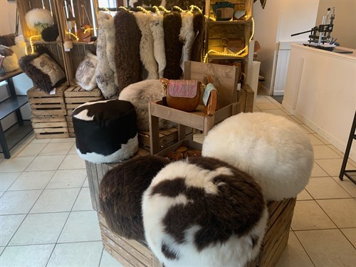 British rare breed sheepskin cushions, rugs and poufs handmade by the Hyde and Sheep studio.